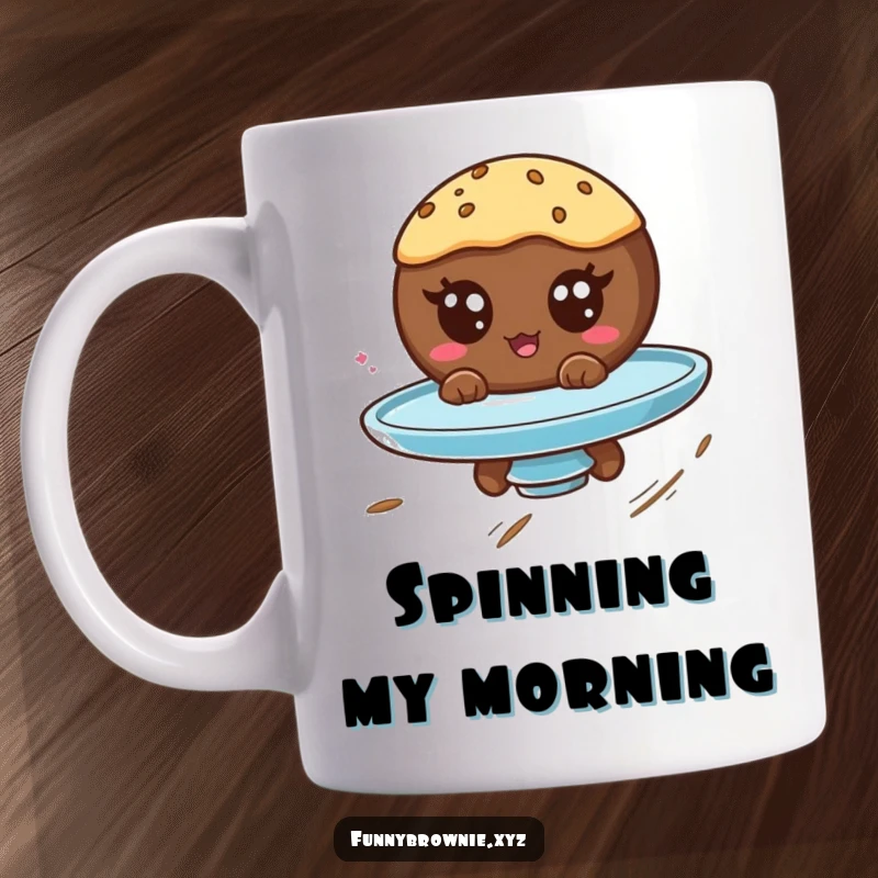 Funny mug featuring a round brownie character with googly eyes spinning on a plate, depicting joyful, dizzy fun.