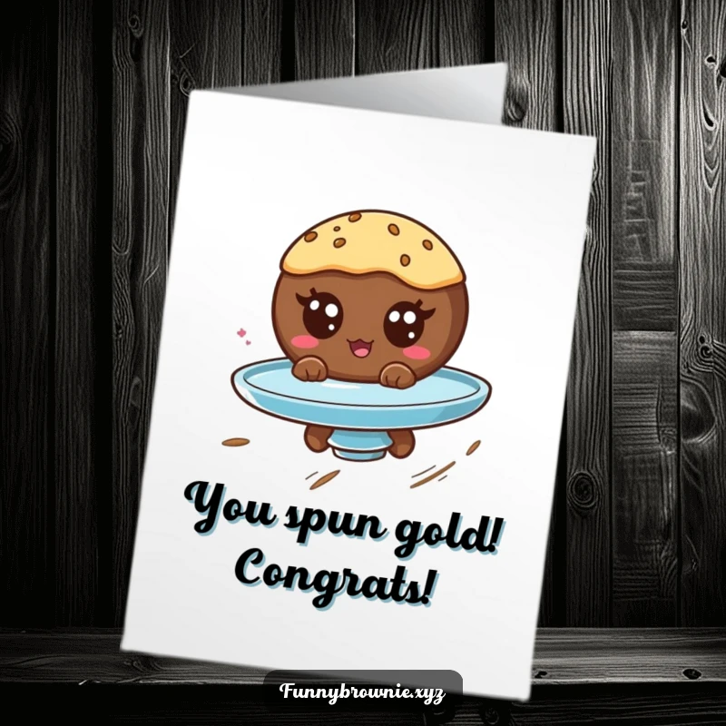 Funny Free Printable Congratulations Card: A round brownie with googly eyes joyfully rides on a spinning plate, celebrating.